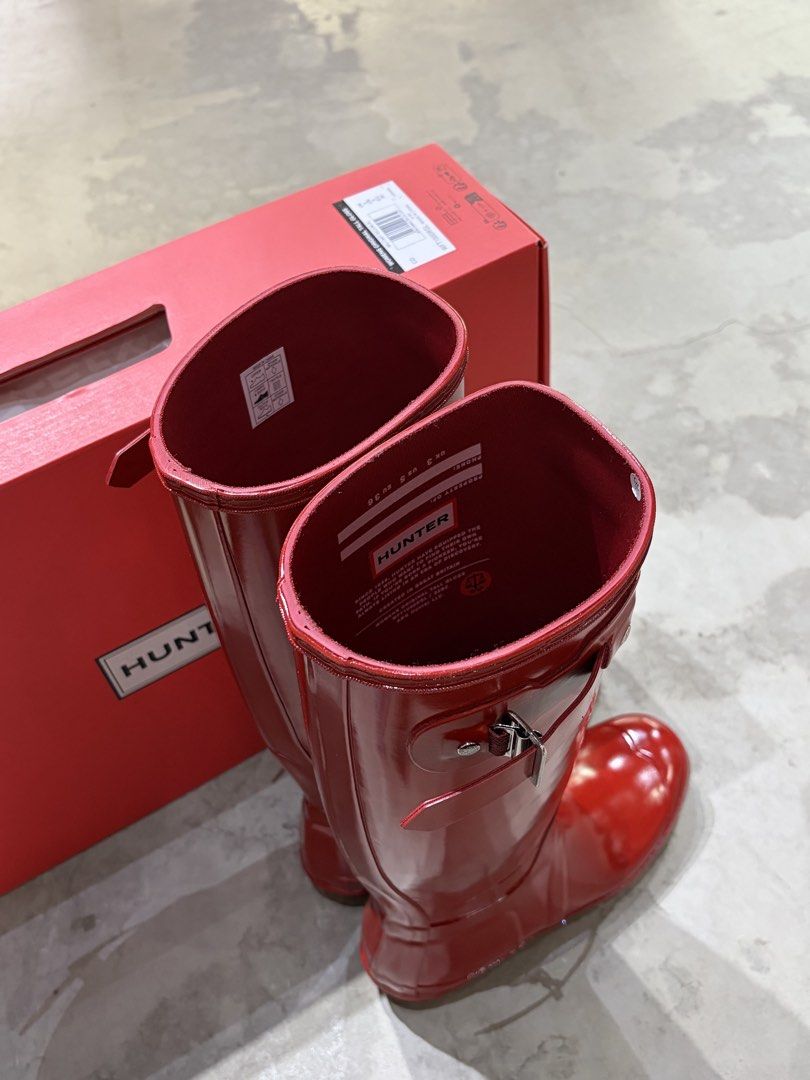 Hunter Red Gloss Tall Rain Boots (Category: Boots) located in Manila. Submitted by kitchwizzle (Listing ID 1461890197, Image 1). Description: - Bright red Hunter tall rain boots - Glossy finish - Size: US 5 EU 36 UK 3 - Condition: Worn thrice, still good as new - RFS: Too small, won’t fit when needed for winter - Bought it in Japan for ₱10,500 - (Might include original box - still looking for it) - Comes with original paperbag.