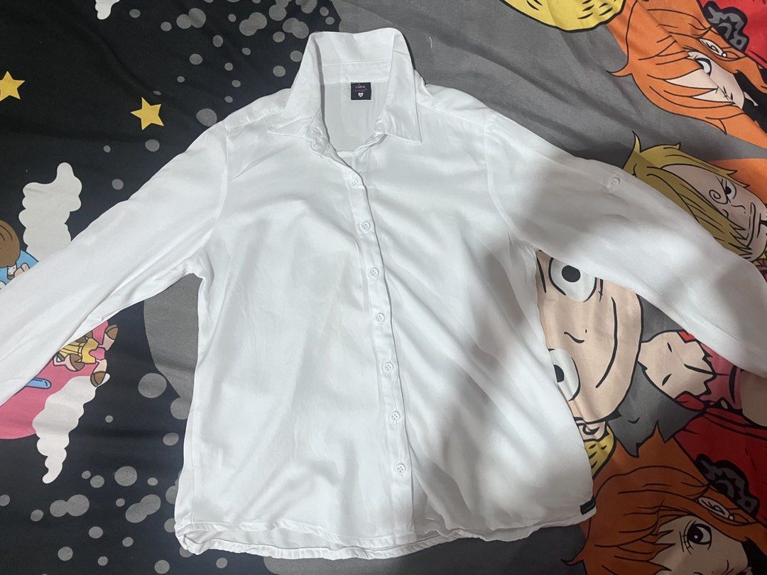 I Love Crissa White Button-Up Shirt (Category: Shirts) located in Manila. Submitted by whiiimsssy (Listing ID 1461936250, Image 1). Description: - Classic white button-up shirt - Brand: I Love Crissa - Size: S - Material: Cotton-Polyester blend - Versatile: Great for work or casual wear - Easy to style.