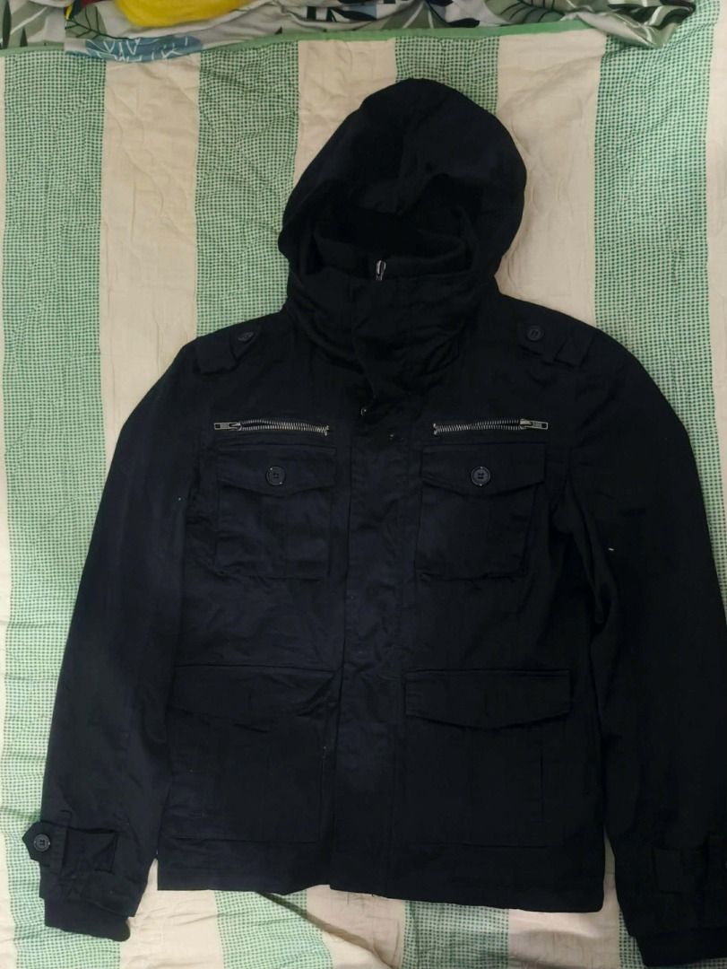 IMP Black Jacket Size S (Category: Coats, Jackets and Outerwear) located in Binalonan. Submitted by supremo_d1 (Listing ID 1461932923, Image 1). Description: - Brand: IMP - Color: Black - Size: S - Closure: Zip-up front with button closures - Pockets: Two front pockets with button closures, one zippered chest pocket - Features: Ribbed collar.