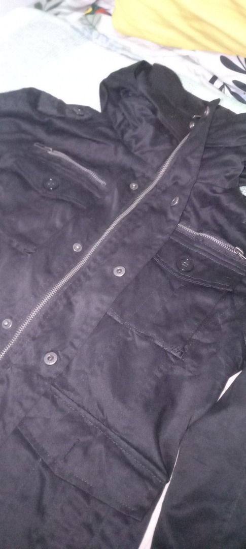IMP Black Jacket Size S (Category: Coats, Jackets and Outerwear) located in Binalonan. Submitted by supremo_d1 (Listing ID 1461932923, Image 3). Description: - Brand: IMP - Color: Black - Size: S - Closure: Zip-up front with button closures - Pockets: Two front pockets with button closures, one zippered chest pocket - Features: Ribbed collar.
