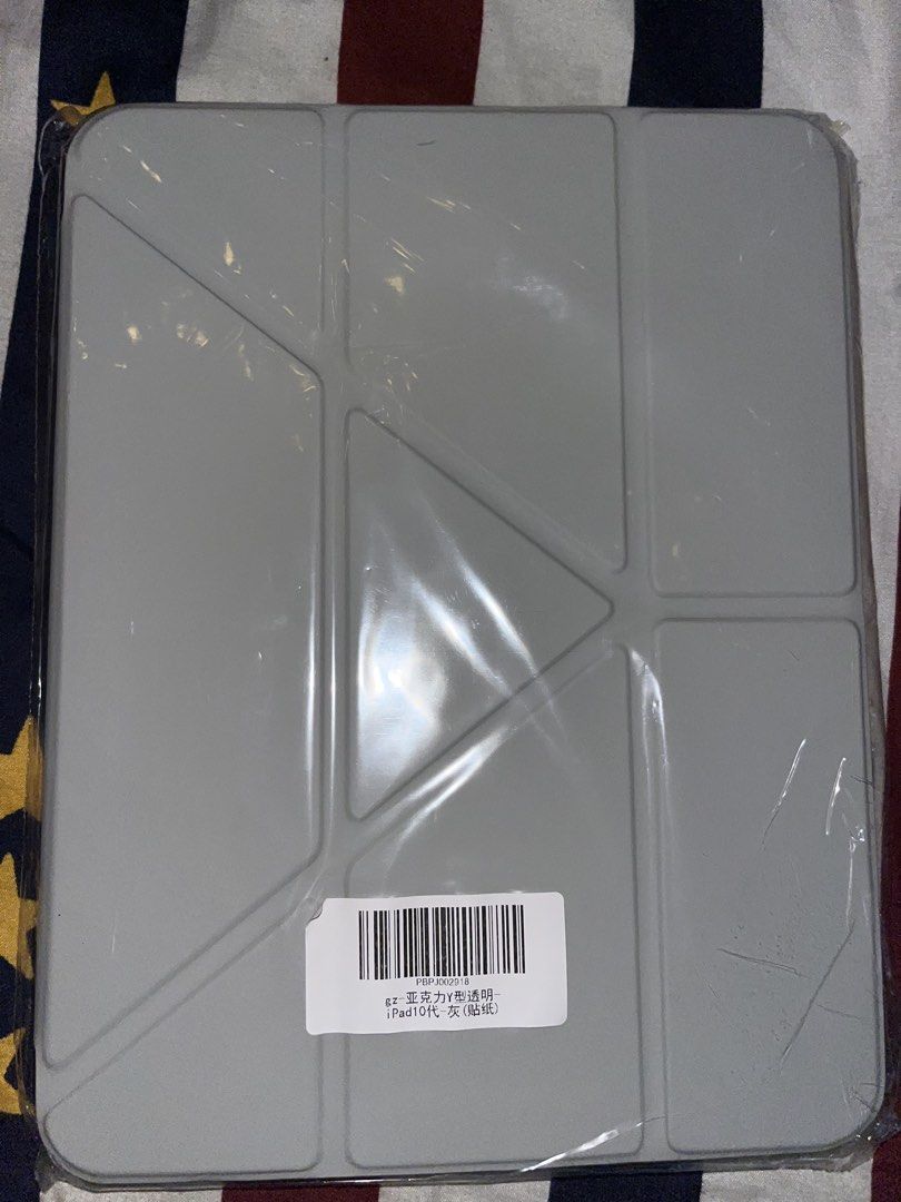 iPad 10th Gen Case with Stickers (Category: Cases & Sleeves) located in Cotabato. Submitted by sylvia_gertrude (Listing ID 1461842575, Image 2). Description: -Ipad a16 case with stickers - Clear hard shell case for iPad 10th Generation - Includes a sheet of cute space-themed stickers - Foldable grey cover for added protection and style - Keeps your iPad safe and allows for personalization RFS: got the wrong case because this is not my unit huhu. 