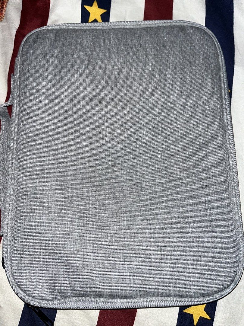 Ipad a16 bag/case (gray) (Category: Luxury Bags & Wallets) located in Cotabato. Submitted by sylvia_gertrude (Listing ID 1461842883, Image 2). Description: - Light grey storage bag - Zippered closure for secure storage - Model FH-BAG-1914 - Comes in original packaging - Ideal for organizing items or for travel needs RFS: wrong order for my unit. Price is negotiable.