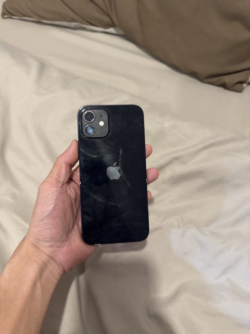 Iphone 12 128gb (Category: Cases & Sleeves) located in Manila. Submitted by neweagle_d2f9d9 (Listing ID 1461962999, Image 1). Description: Iphone 12 128gb Issues: walang .5 yung camera No face id Replaced battery.