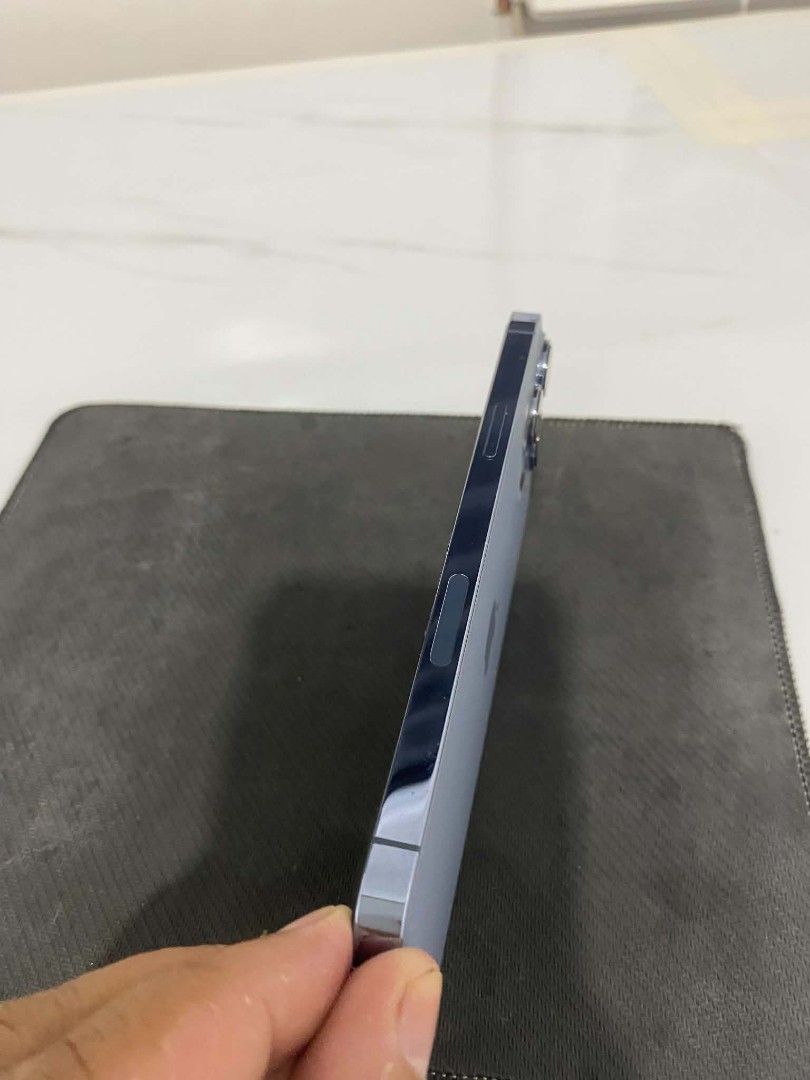 IPhone 13 Pro max 512gb (Category: E-Readers) located in Puerto Galera. Submitted by nexkinz (Listing ID 1461936024, Image 3). Description: FOR SALE: iPhone 13 Pro Max (512GB)Price: ₱28,000 (Slightly Negotiable)Storage: 512GB (Huge storage, perfect for heavy photo/video use)Condition: 10/10 Cosmetic condition. Super makinis, no scratches, no dents.History: Never been opened or repaired. All original parts. Face ID and True Tone are 100% working.B