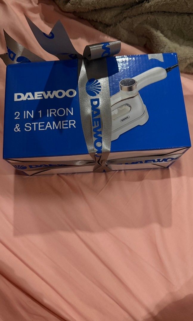 Iron and steamer (Category: Irons & Steamers) located in Malabon City. Submitted by mrsuabae (Listing ID 1461913156, Image 2). Description: DAEWOO 2-in-1 Iron & Garment Steamer – Brand New Brand new / unused Daewoo 2-in-1 Iron & Steamer. Comes with original box and packaging. • Dry & steam ironing • LCD display • 3 steam levels • 1200W • 45-second fast steam output • Ceramic-coated aluminum ironing panel • Compact design • 220–240V • Color: Cream