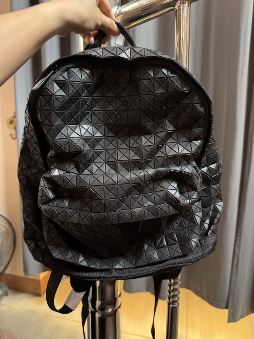 Issey Miyake Bao Bao Geometric Black Backpack (Category: Backpacks) located in Quezon City. Submitted by arc.robi (Listing ID 1461993233, Image 1). Description: - Authentic Issey Miyake Bao Bao backpack - Color: Black - Signature geometric pattern all over - Zipper closure - Interior branded tag - Padded shoulder straps for comfort - Ideal for daily use or travel.