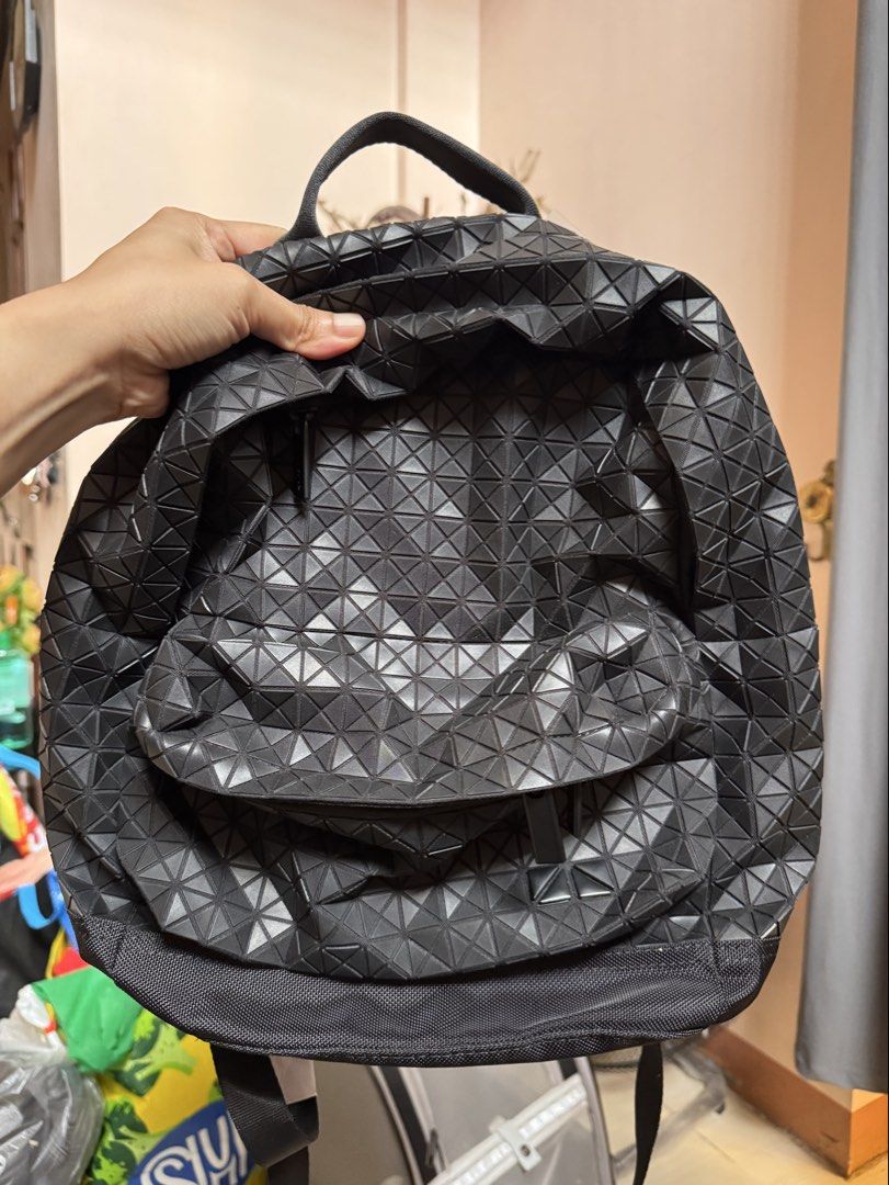 Issey Miyake Bao Bao Geometric Black Backpack (Category: Backpacks) located in Quezon City. Submitted by arc.robi (Listing ID 1461993233, Image 2). Description: - Authentic Issey Miyake Bao Bao backpack - Color: Black - Signature geometric pattern all over - Zipper closure - Interior branded tag - Padded shoulder straps for comfort - Ideal for daily use or travel.