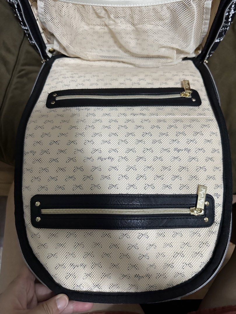 Itzy Ritzy Boss Plus Backpack - Kelly (Category: Backpacks) located in Cainta. Submitted by iamalb (Listing ID 1461892840, Image 3). Description: - Chic black tweed diaper backpack from Itzy Ritzy. - Elegant gold hardware and black faux leather trim. - Multiple interior pockets for superior organization. - Convenient front zip pocket, back pocket for laptop, and insulated side pockets. - Comes with a stylish tassel charm, changing pad, and stroll
