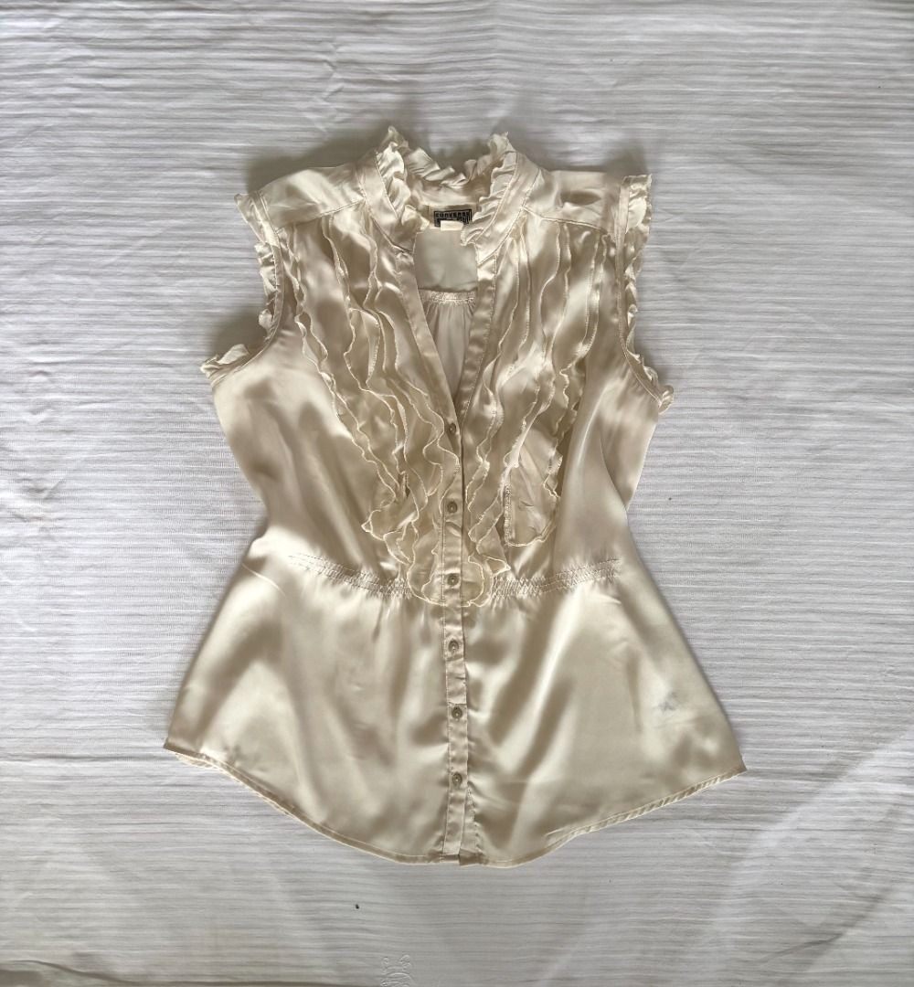 Ivory Ruffle Satin Top (Category: Blouses) located in Tuguegarao City. Submitted by declutterwithfran (Listing ID 1461828187, Image 1). Description: 𖦹 ׂsize : m - semi l 𖦹 ׂ b: 36" - 38" 𖦹 ׂ l: 22" MOD: JNT MOP: Gcash/ Maribank/ Bank Transfer.