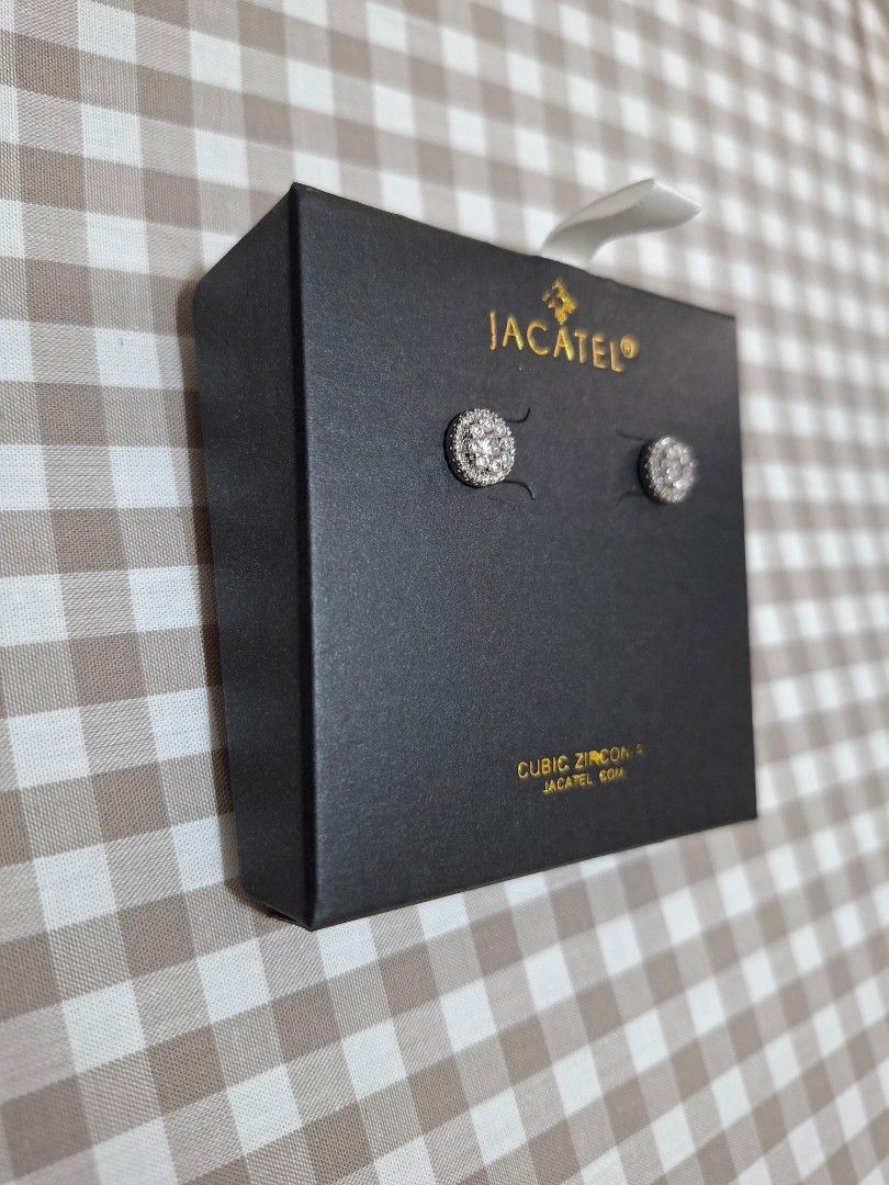 JACATEL Cubic Zirconia Stud Earrings (Category: Earrings) located in Pasig City. Submitted by avcan (Listing ID 1461798602, Image 3). Description: - Brand: JACATEL - Style: Sparkly stud earrings - Stones: Cubic zirconia in a halo design - Packaging: Original black box included - Extras: Extra earring backs provided - Occasion: Suitable for everyday wear or special events - Used once..