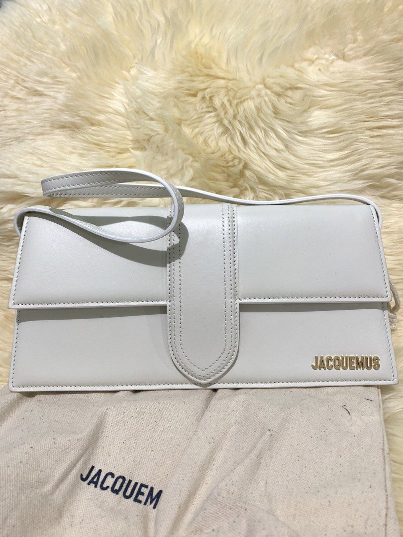 Jacquemus Le Chiquito Long Bag White (Category: Luxury Bags & Wallets) located in Manila. Submitted by mylildarlingamari (Listing ID 1461898250, Image 1). Description: - Authentic White Jacquemus Bag - Genuine Leather Material - Elegant Gold Hardware - Comes with Original Dust Bag and Tags - Minor scuff mark on the front (clearly shown in photos) - Ideal for evening events and going out.