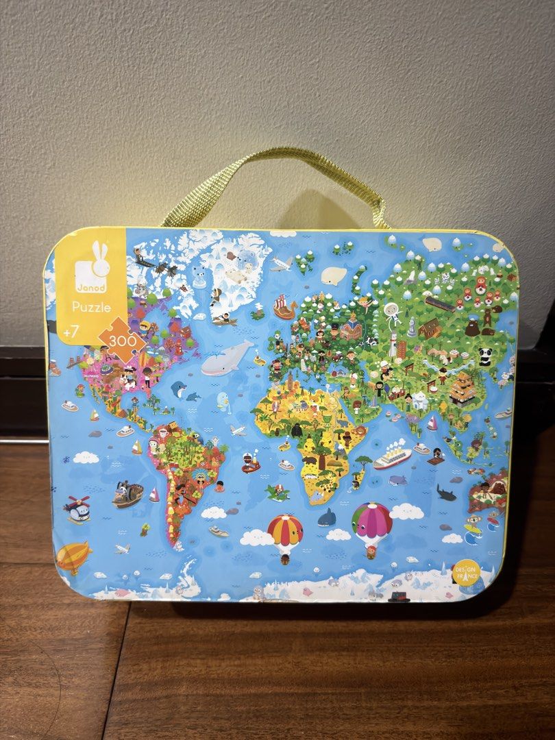 Janod World Map Puzzle 300 Pieces (Category: Board Games & Puzzles) located in San Juan City. Submitted by addieandmatty (Listing ID 1461964692, Image 1). Description: - Janod 300-piece World Map Puzzle - Recommended for ages 7 and up - All puzzle pieces are complete - Includes a sturdy case with a handle for easy storage and transport - Educational and fun for learning geography.