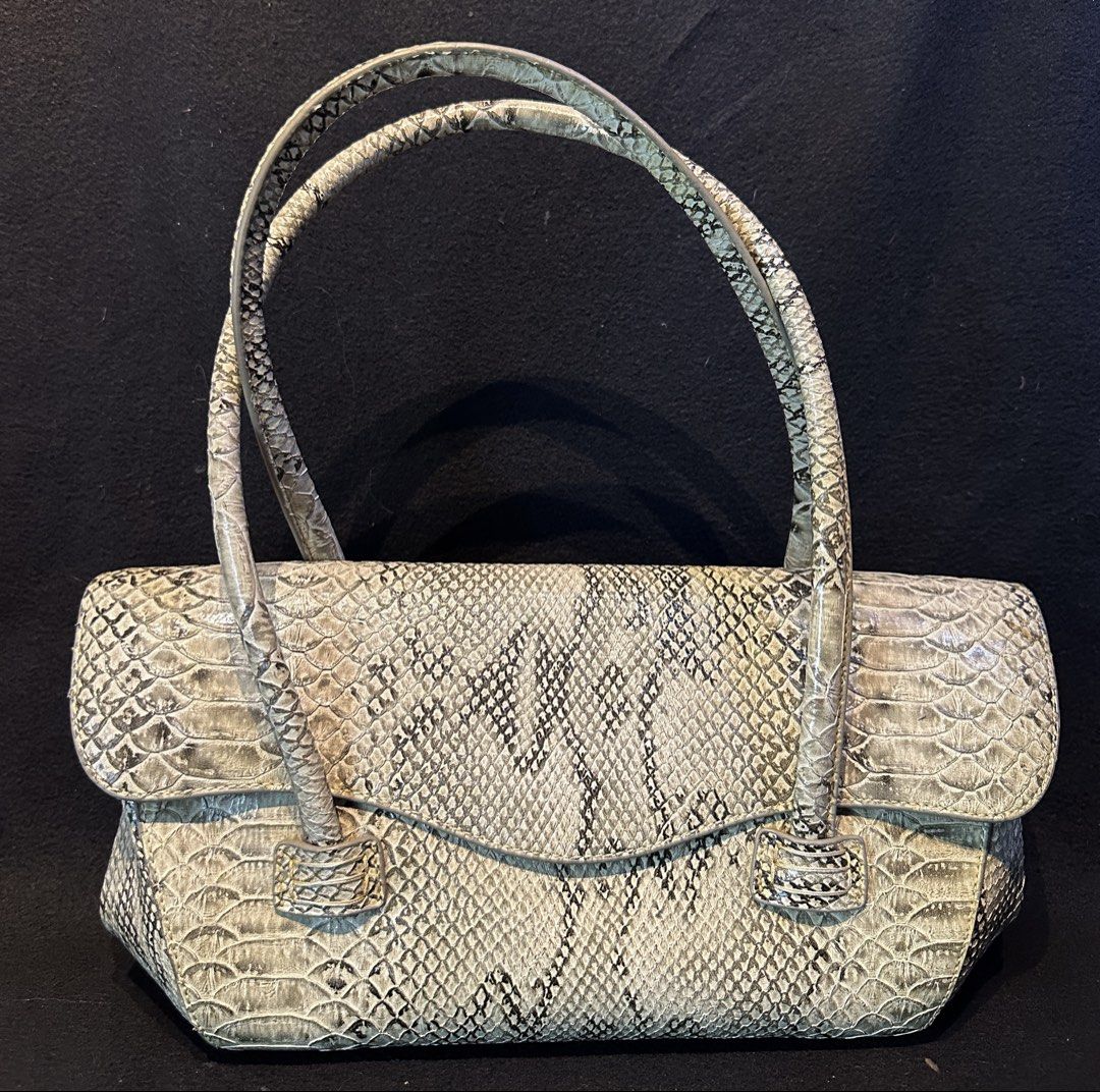 Japan Snake leather Long handle, shoulder bag (Category: Luxury Bags & Wallets) located in Quezon City. Submitted by WIMC2ndaccount (Listing ID 1461940318, Image 1). Description: Japan bag Fashion bag Embossed snake bag Good condition Vintage Normal sign of ussage 37 X 20 centimeters .