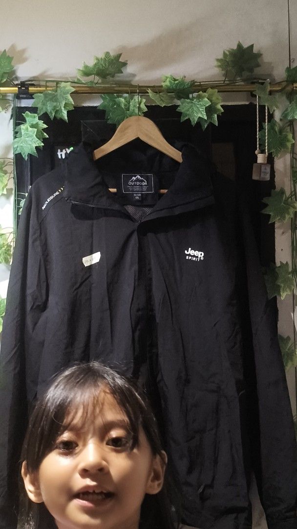 Jeep Spirit Outdoor Jacket (Category: Coats, Jackets and Outerwear) located in Manila. Submitted by moneyroll420 (Listing ID 1461800433, Image 1). Description: - Brand: Jeep Spirit - Type: Outdoor Jacket / Windbreaker - Color: Black - Features: Zipper closure, 'Outdoor' logo on tag, 'Ampleisure' text on sleeve - Ideal for: Outdoor activities and adventures.