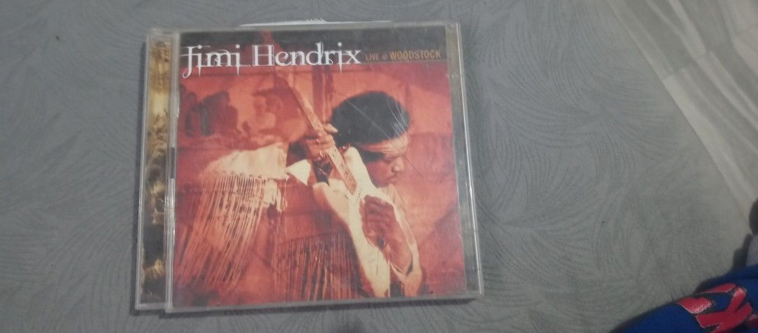 Jimi Hendrix - Live & Unreleased CD (Category: CDs & DVDs) located in Floridablanca. Submitted by reddiamonds777 (Listing ID 1461896688, Image 1). Description: - Jimi Hendrix Live & Unreleased CD - Features live recordings and unreleased tracks - Includes hits like 'Woodstock' and 'Fire' - A must-have for any Hendrix fan - Classic collection.