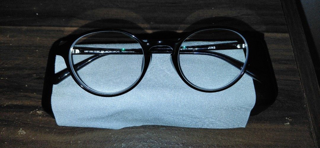 JINS Black Round Eyeglasses with Case (Category: Sunglasses & Eyewear) located in San Pablo. Submitted by janjan_98 (Listing ID 1462015692, Image 2). Description: - Brand: JINS - Color: Black - Frame Shape: Round - Condition: Like new (just tried on a few times) See last photo for prescription details if interested in lens - Includes: Original hard case and cleaning cloth - Ideal for: Everyday wear .