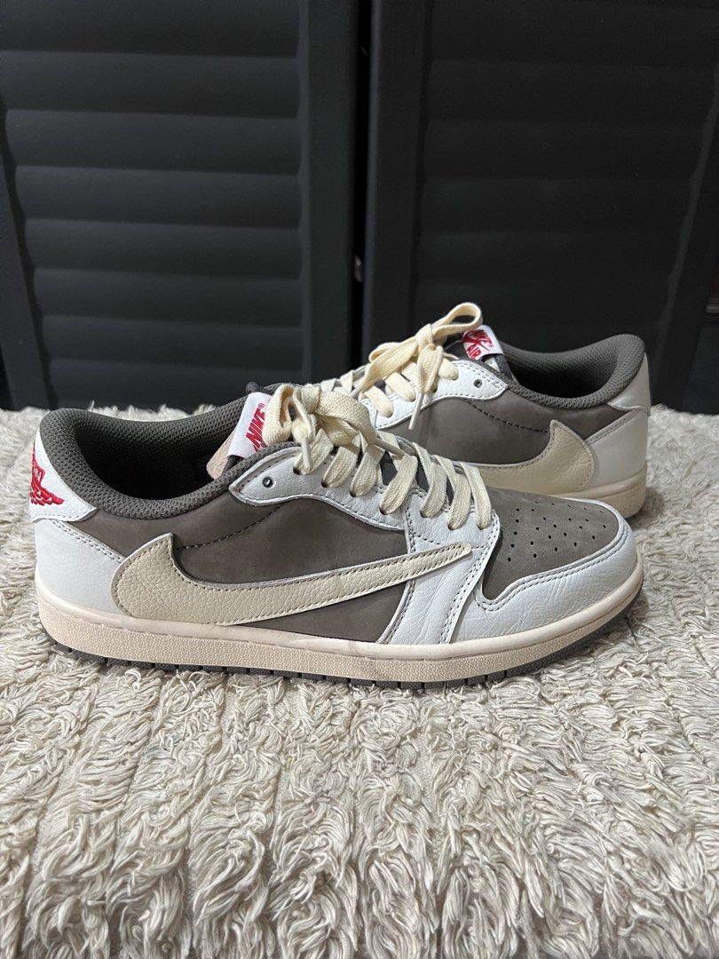 Jordan 1 x Travis Scott Reverse Mocha (Category: Casual Shoes) located in Angono. Submitted by odd.fitt (Listing ID 1461971566, Image 1). Description: UA LJR batch Not thrifted With box Bought last 2024, but used 5 times only Ingat na ingat sa paggamit, minimal crease🥶 8.5 US men 42 EU 26.5 cm .