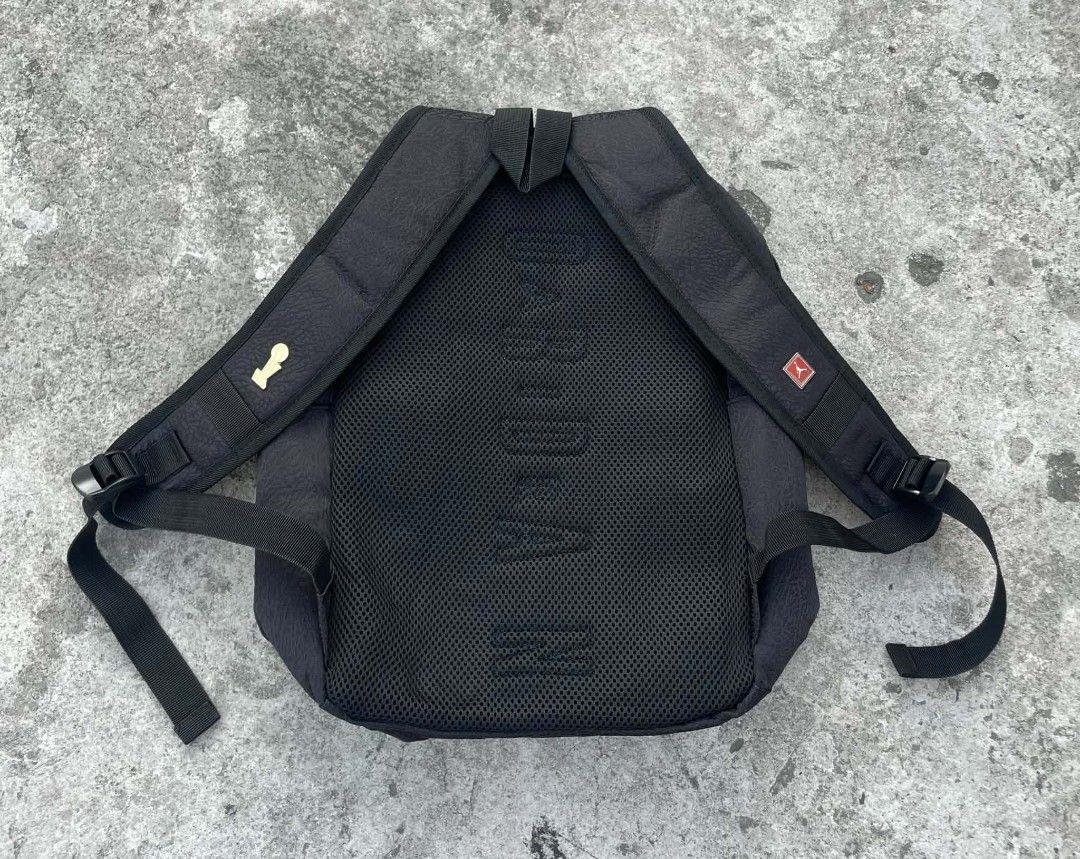Jordan Black Elephant Print Backpack with Pins (Category: Backpacks) located in Cavite. Submitted by ara.thrifts (Listing ID 1461819314, Image 2). Description: - Stylish black Jordan backpack - Unique elephant print texture - Iconic Jumpman logo on the front - Comes with cool Jordan-themed pins - Comfortable mesh back panel - Adjustable straps for a perfect fit - Ideal for everyday use or travel adventures.