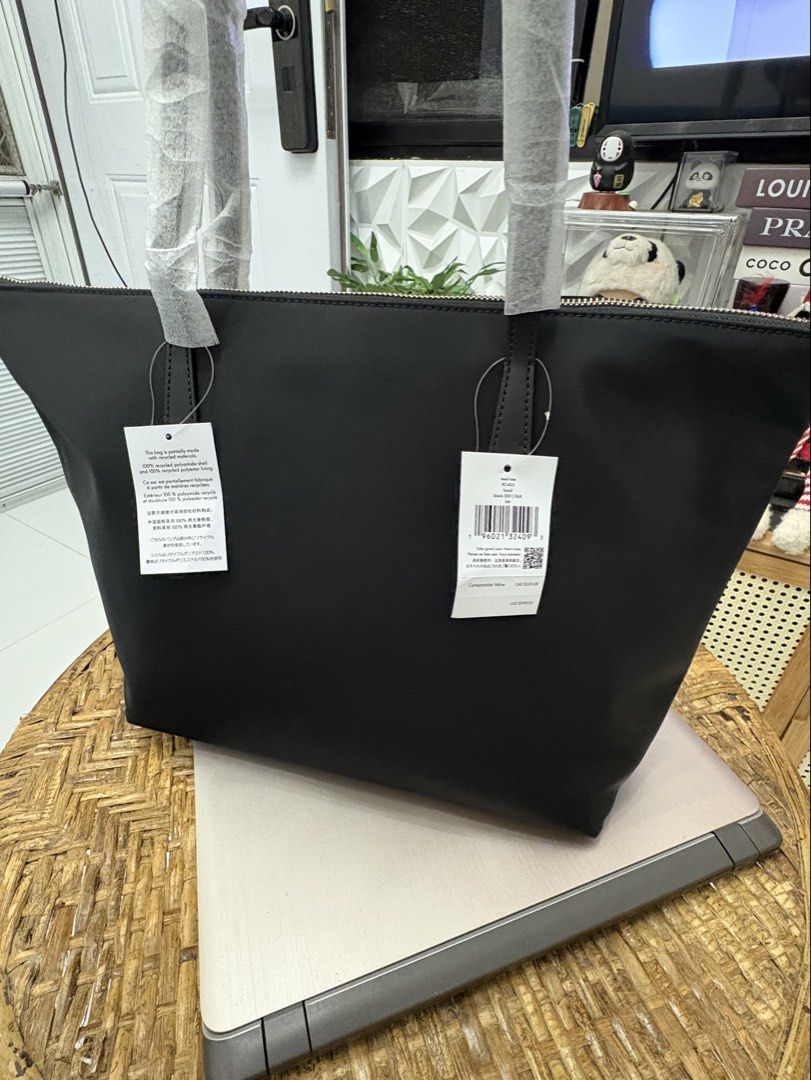 kate spade kitt nylon zip tote black (Category: Tote Bags) located in Cavite. Submitted by mylittlechicshop (Listing ID 1439644209, Image 2). Description: ‼️Restock Alert‼️ Kitt Nylon Zip Tote ✅Last 2 black avail ❌1 hot fudge for drmydsk (crousel) ❌1 black reserved to Anne A ❌1 black for Cloud N Recycled Nylon with Smooth PVC Trim L:12" (bottom) L:17.6" (top) W:4.8" H:11" Strap Drop: 11" Fits A4-Sized Document Folders Tote/ Document Bag Signature