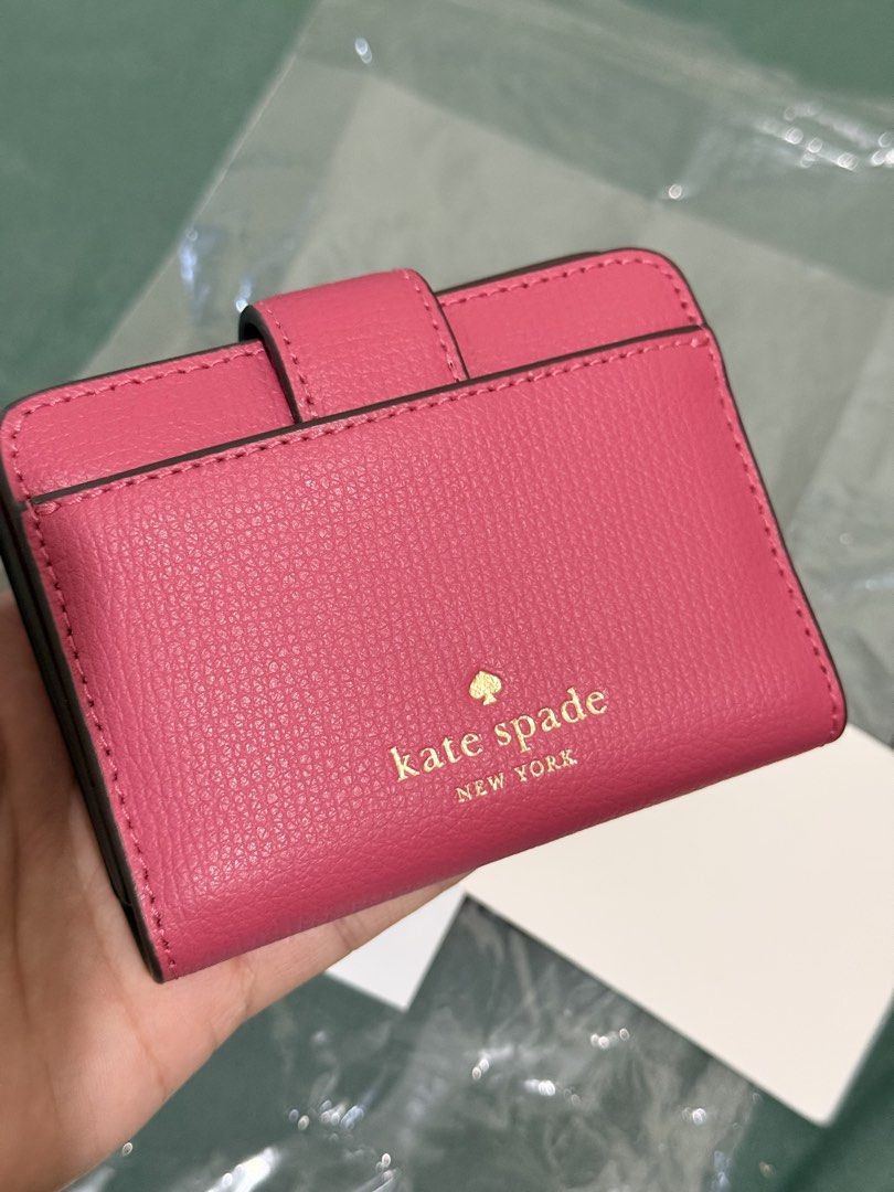 Kate Spade Small wallet Phoebe (Category: Wallets & Card holders) located in San Mateo. Submitted by patdrme (Listing ID 1461908173, Image 3). Description: FOR SALE: Kate Spade Small wallet "Phoebe" Rose oil Good condition. What you see is what you get. Original and Authentic money back guarantee. Can fit 5-6 cards + Folded bills and coins (konti lang) RFS: Declutter. .