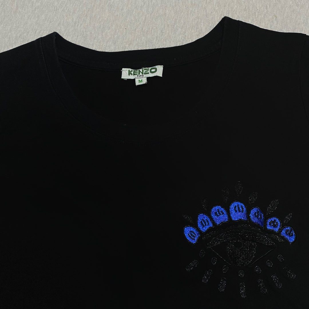 Kenzo Paris (Category: Others Tops) located in Mabalacat. Submitted by stellargarments (Listing ID 1461837790, Image 2). Description: L - 24 W - 17 Condition - 9/10 Ganda ng quality! Smooth tela medj stretchy smooth on skin! Embroidered Logo! With necktag cut washtags Smooth on skin fabric Need wash fresh from bale.