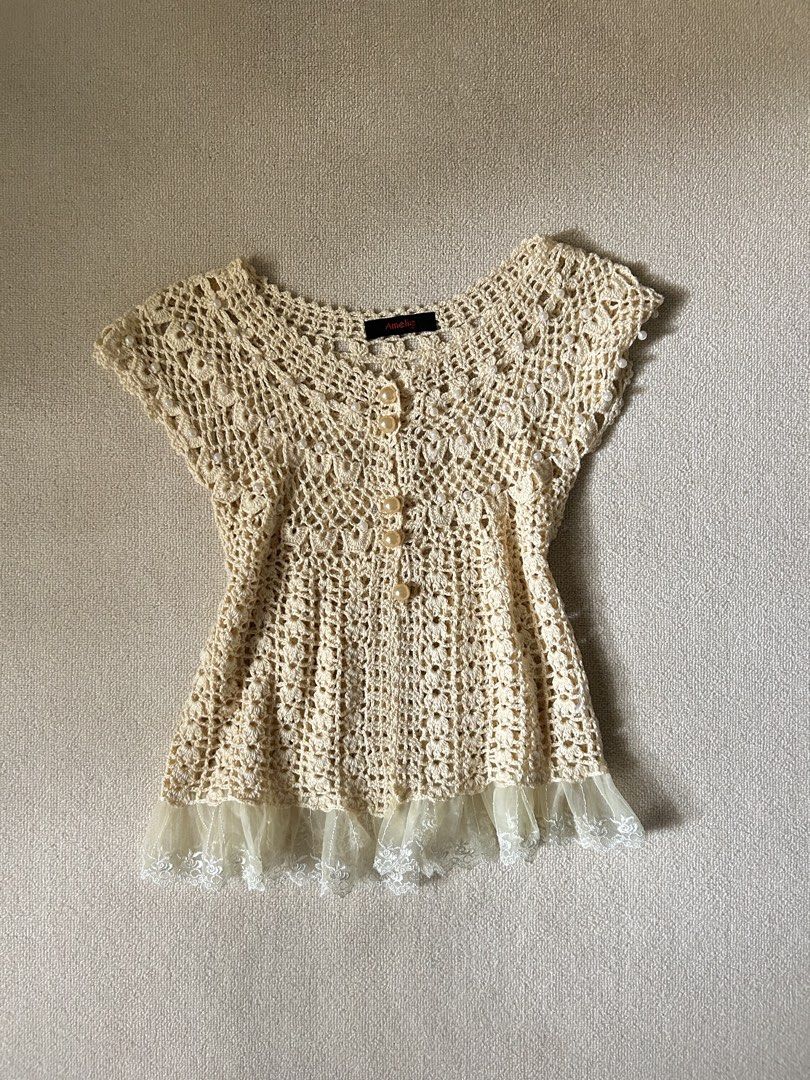 Khaki Amelie Knit top (Category: Others Tops) located in Quezon City. Submitted by y2klar (Listing ID 1461978706, Image 1). Description: Khaki Amelie Top Size-Small-Medium L-24 Width-15 10/10 Condition no flaws..