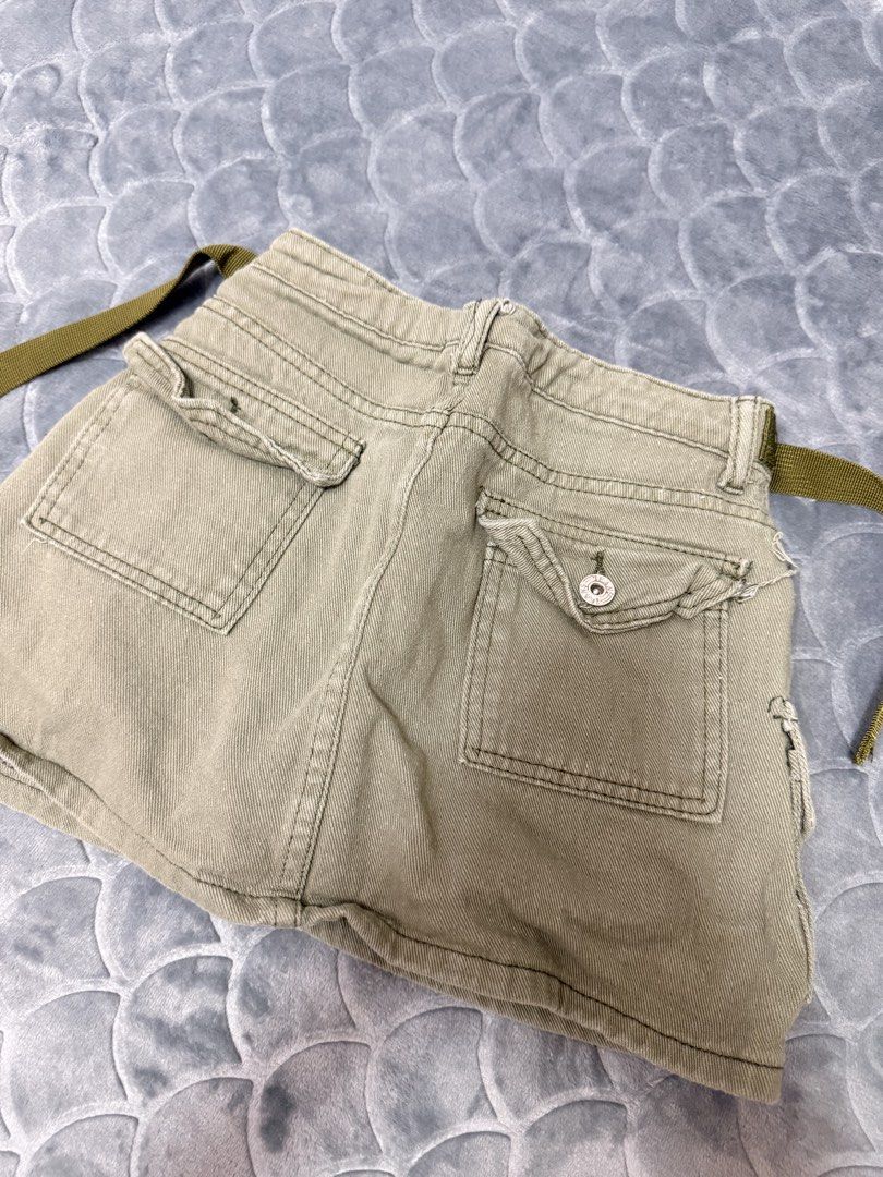 Khaki Cargo Mini Skort with Belt (Category: Skirts) located in Tarlac. Submitted by kylienclrzbl (Listing ID 1461918368, Image 2). Description: - Khaki cargo mini skirt - Zip fly and button closure - Multiple pockets (front and back) - Comes with a matching fabric belt - Ideal for casual outfits - Versatile and easy to style - waist 23-24.