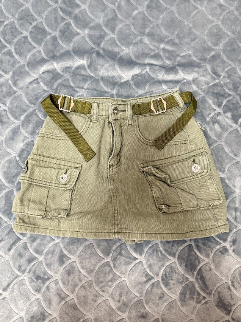 Khaki Cargo Mini Skort with Belt (Category: Skirts) located in Tarlac. Submitted by kylienclrzbl (Listing ID 1461918368, Image 1). Description: - Khaki cargo mini skirt - Zip fly and button closure - Multiple pockets (front and back) - Comes with a matching fabric belt - Ideal for casual outfits - Versatile and easy to style - waist 23-24.