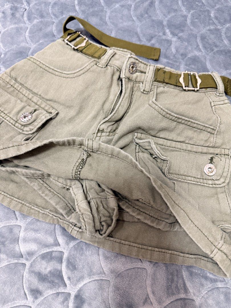 Khaki Cargo Mini Skort with Belt (Category: Skirts) located in Tarlac. Submitted by kylienclrzbl (Listing ID 1461918368, Image 3). Description: - Khaki cargo mini skirt - Zip fly and button closure - Multiple pockets (front and back) - Comes with a matching fabric belt - Ideal for casual outfits - Versatile and easy to style - waist 23-24.