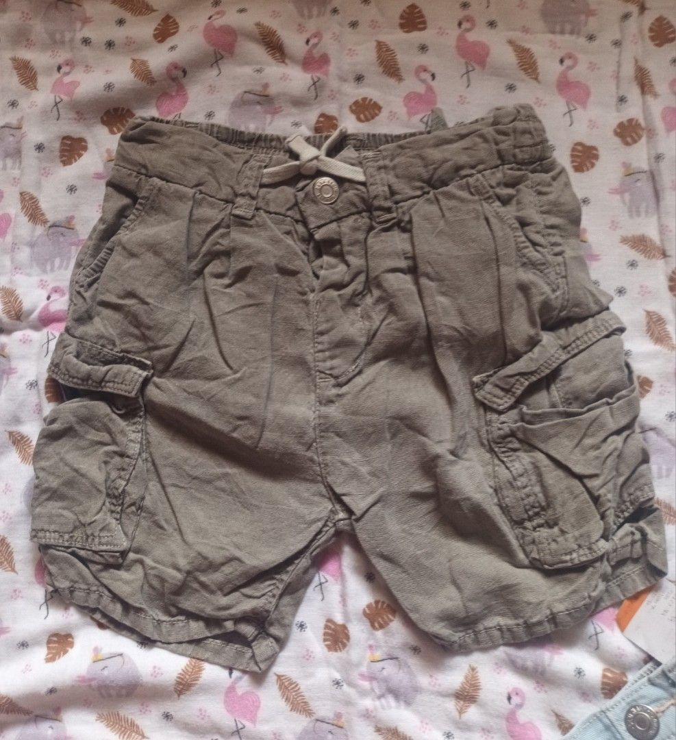 Kids Cargo Shorts (Category: Babies & Kids Fashion) located in Pasig City. Submitted by zeallion_149f0e (Listing ID 1461868652, Image 1). Description: - Olive green cargo shorts for kids - Comfortable elastic waistband with adjustable drawstring - Multiple functional pockets on front and sides - Ideal for everyday wear and outdoor activities - Made with durable material for lasting wear.