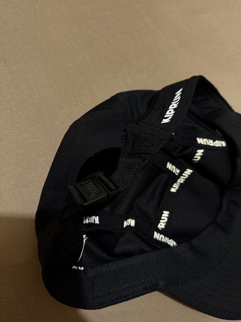 Kiprun Black Running Cap (Category: Caps & Hats) located in Cabuyao City. Submitted by beverlybella (Listing ID 1461902184, Image 3). Description: - Kiprun black running cap - Lightweight and breathable material - Adjustable strap for a secure fit - Ideal for running and outdoor activities - Easy to pack and carry - Keeps sun out of your eyes.