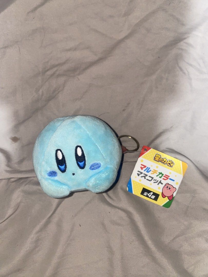 Kirby Multi Color Mascot Plush Keychain (Category: Plushies & Soft Toys) located in San Mateo. Submitted by fishermanbeanie (Listing ID 1461844845, Image 1). Description: - Adorable light blue Kirby plush keychain. - Original tag still attached. - Perfect for decorating bags, backpacks, or keys. - A delightful collectible for any Kirby enthusiast. - Bring this cute plush home today!.