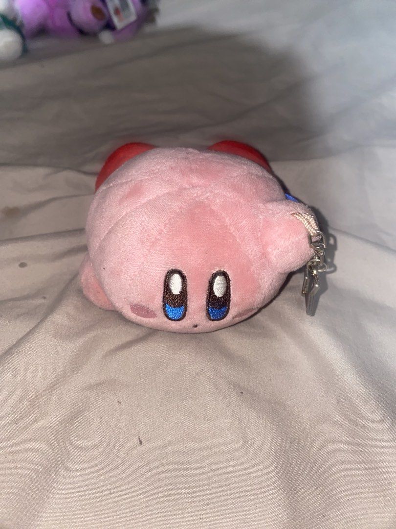 Kirby Plush Keychain Toy (Category: Plushies & Soft Toys) located in San Mateo. Submitted by brattyboi (Listing ID 1461844767, Image 1). Description: - Adorable pink Kirby plush toy - Features a convenient keychain attachment - Compact size, ideal for decorating bags or keys - Resembles a cute gachapon/capsule toy find.