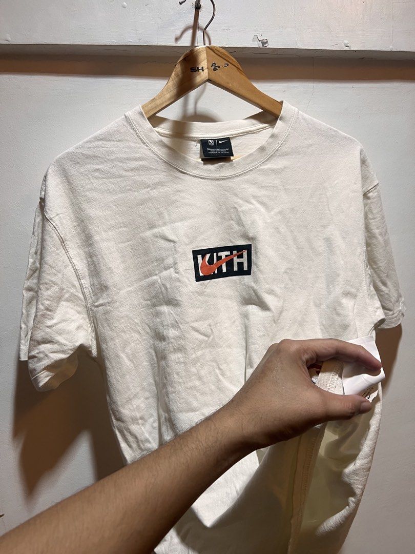 Kith x Nike White T-shirt (Category: Tshirts & Polo Shirts ) located in San Juan, La Union. Submitted by jeggystyle (Listing ID 1461962803, Image 2). Description: - Authentic White Kith x Nike T-shirt - Features iconic Kith logo and Nike swoosh - NBA logo detail on the bottom hem - Perfect for everyday casual wear - Please check photos for detailed condition.