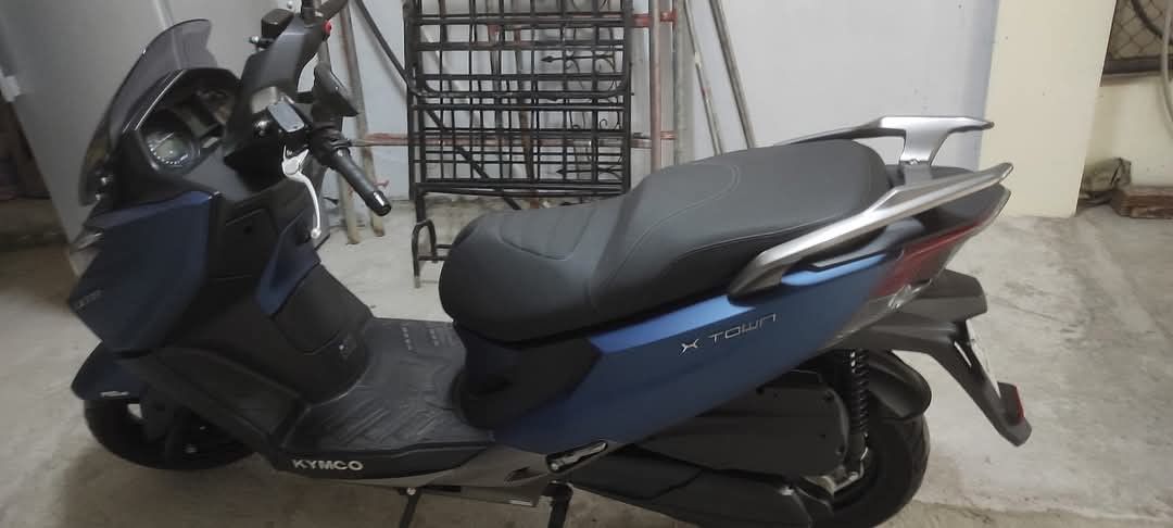 Kymco X-Town 300i Scooter (Category: Motorbikes for Sale) located in San Juan City. Submitted by angelo_padilla (Listing ID 1461957183, Image 3). Description: Blue Kymco X-Town 300i scooter. Automatic transmission. Good for city commuting. Has a large windscreen for wind protection. Comfortable seat. Ready for a new owner. Message me for more details..