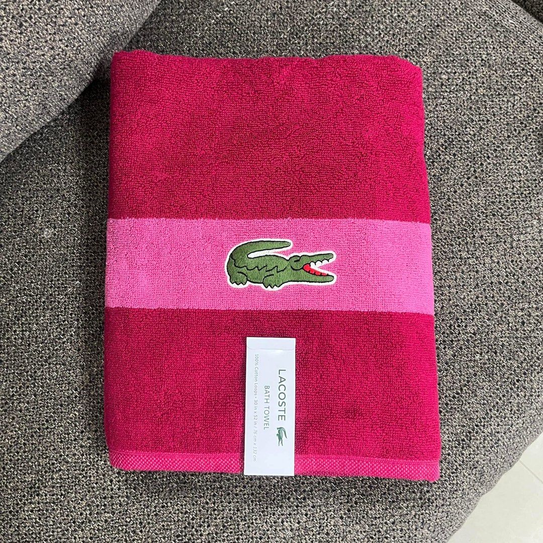 Lacoste Bath Towel - Pink with Crocodile Logo (Category: Bedding & Towels) located in San Remigio. Submitted by shop.rhea.usa (Listing ID 1461826586, Image 1). Description: P1,000 Payment method: BPI Payment first before shipping No reservations 100% authentic from USA - Brand new Lacoste bath towel - Vibrant pink with a lighter pink stripe - Iconic green crocodile logo on stripe - Made from 100% cotton loops - Dimensions: 30 inches x 52 inches (