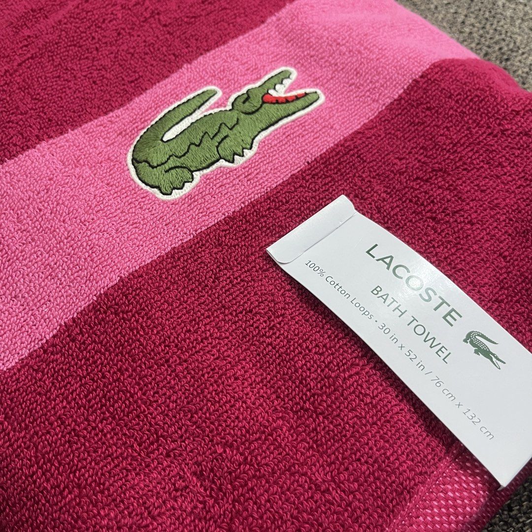 Lacoste Bath Towel - Pink with Crocodile Logo (Category: Bedding & Towels) located in San Remigio. Submitted by shop.rhea.usa (Listing ID 1461826586, Image 2). Description: P1,000 Payment method: BPI Payment first before shipping No reservations 100% authentic from USA - Brand new Lacoste bath towel - Vibrant pink with a lighter pink stripe - Iconic green crocodile logo on stripe - Made from 100% cotton loops - Dimensions: 30 inches x 52 inches (