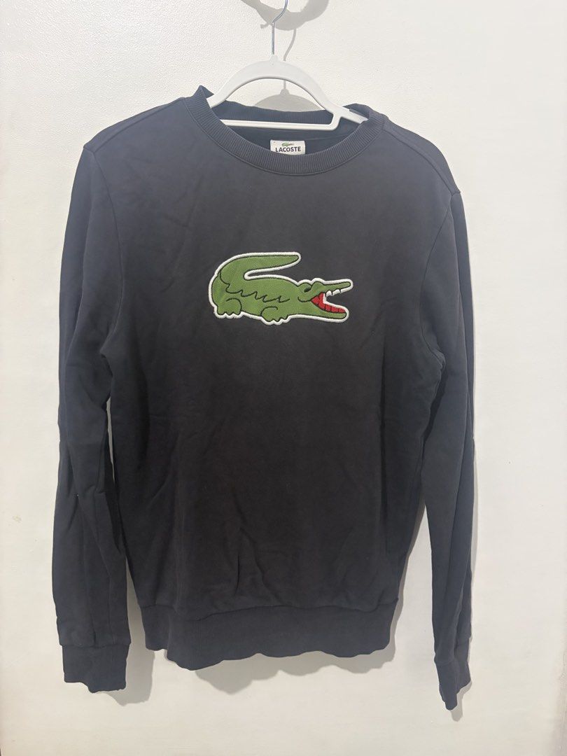 Lacoste Big Logo Sweater (Category: Coats, Jackets and Outerwear) located in Taguig. Submitted by gnvicuna07 (Listing ID 1461965812, Image 2). Description: Lacoste Big Logo Sweater Size 3 on tag Dimes: 22x28 Issues: with Discoloration .