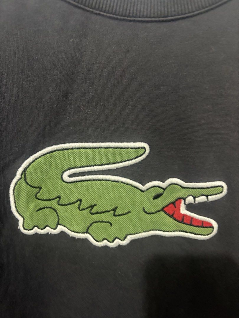 Lacoste Big Logo Sweater (Category: Coats, Jackets and Outerwear) located in Taguig. Submitted by gnvicuna07 (Listing ID 1461965812, Image 3). Description: Lacoste Big Logo Sweater Size 3 on tag Dimes: 22x28 Issues: with Discoloration .
