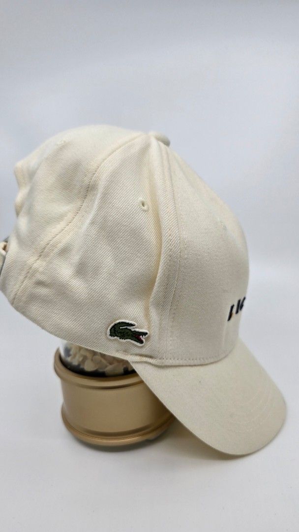 Lacoste Cap Beige (Category: Caps & Hats) located in Quezon City. Submitted by ShoesManila (Listing ID 1461984422, Image 2). Description: Lacoste Cap Fits most Conditin: Excellent Color rate: 10/10 Complete tags - Classic beige Lacoste cap - Embroidered 'LACOSTE' logo on the front - Iconic crocodile logo on the side - Adjustable strap at the back for a comfortable fit - Perfect for everyday wear Ready to ship and wear Location: Diliman, QC.
