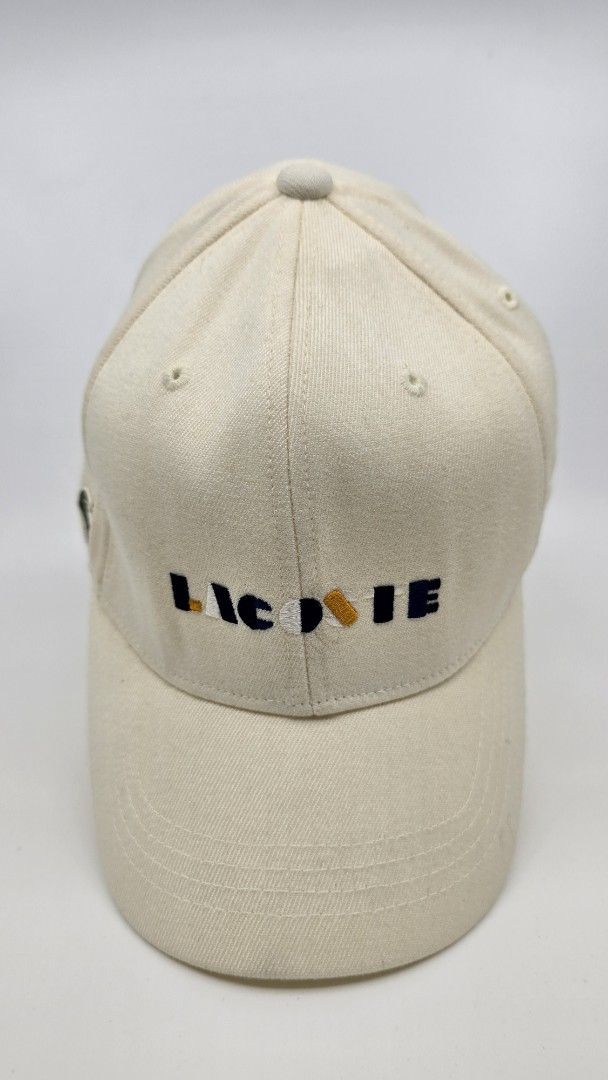 Lacoste Cap Beige (Category: Caps & Hats) located in Quezon City. Submitted by ShoesManila (Listing ID 1461984422, Image 1). Description: Lacoste Cap Fits most Conditin: Excellent Color rate: 10/10 Complete tags - Classic beige Lacoste cap - Embroidered 'LACOSTE' logo on the front - Iconic crocodile logo on the side - Adjustable strap at the back for a comfortable fit - Perfect for everyday wear Ready to ship and wear Location: Diliman, QC.
