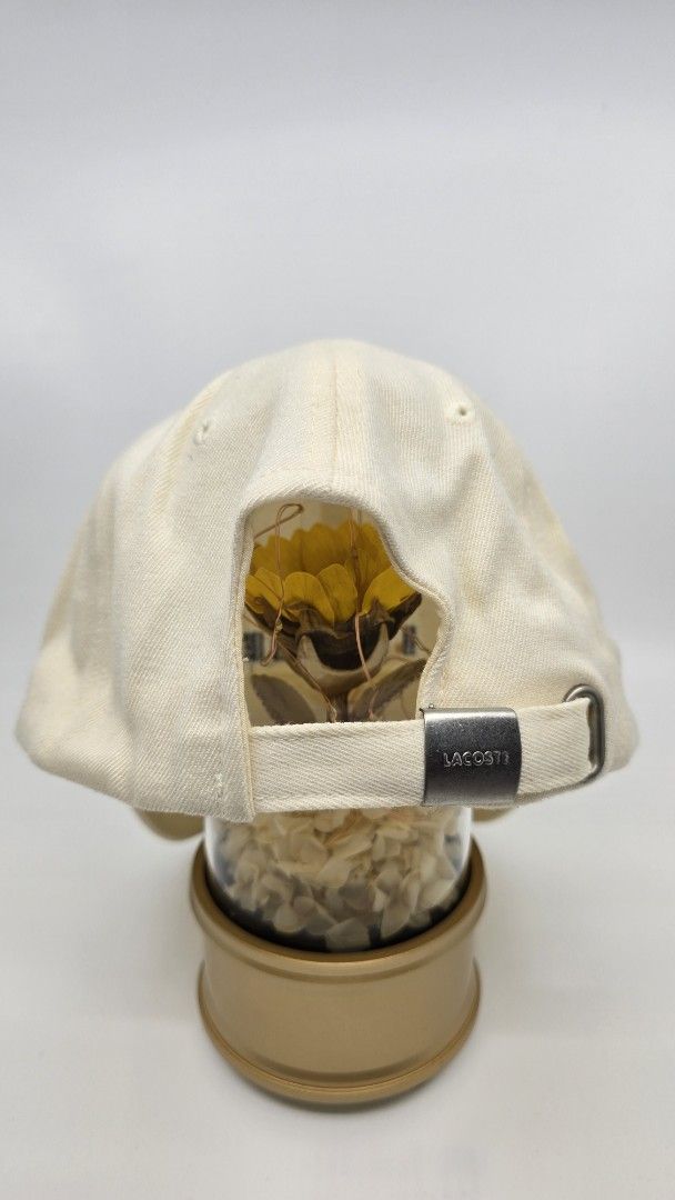 Lacoste Cap Beige (Category: Caps & Hats) located in Quezon City. Submitted by ShoesManila (Listing ID 1461984422, Image 3). Description: Lacoste Cap Fits most Conditin: Excellent Color rate: 10/10 Complete tags - Classic beige Lacoste cap - Embroidered 'LACOSTE' logo on the front - Iconic crocodile logo on the side - Adjustable strap at the back for a comfortable fit - Perfect for everyday wear Ready to ship and wear Location: Diliman, QC.