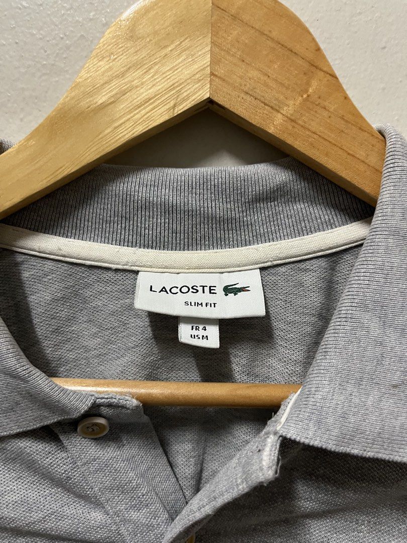 Lacoste Grey Stripes Polo Shirt (Category: Formal Shirts) located in Mandaluyong City. Submitted by pochesguerra (Listing ID 1461895710, Image 3). Description: Lacoste Grey Stripes Polo Shirt SIZE: M DIMES: 19.5 x 27 ISSUE: Faded, Color Rate 8 / 10 PRICE: 600 PESOS + SHIPPING FEE.