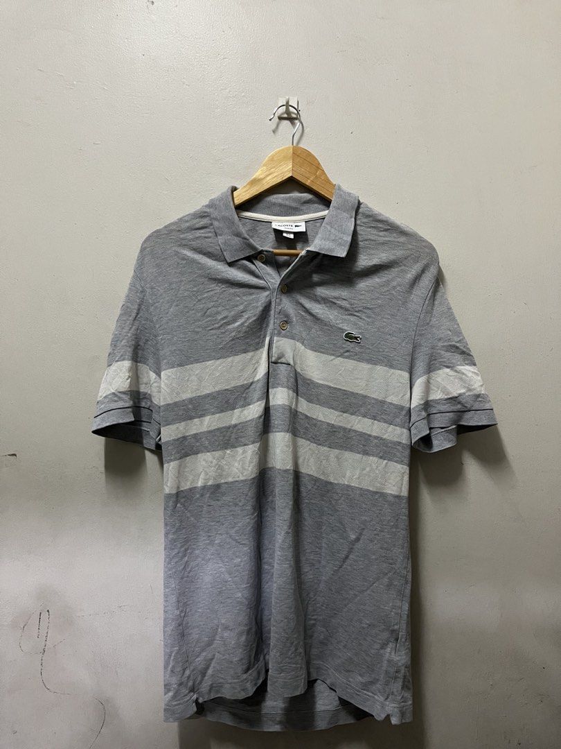 Lacoste Grey Stripes Polo Shirt (Category: Formal Shirts) located in Mandaluyong City. Submitted by pochesguerra (Listing ID 1461895710, Image 1). Description: Lacoste Grey Stripes Polo Shirt SIZE: M DIMES: 19.5 x 27 ISSUE: Faded, Color Rate 8 / 10 PRICE: 600 PESOS + SHIPPING FEE.