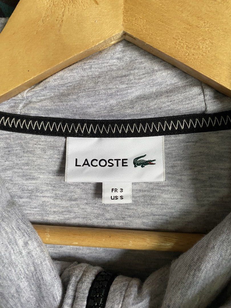 Lacoste Grey Zip-Up Hoodie (Category: Hoodies) located in Santa Barbara. Submitted by thrifthub24 (Listing ID 1461935142, Image 3). Description: - Grey Lacoste zip-up hoodie - Size: FR 3 / US S - Fit up to Large - Width: 22.5 - Length: 27 - Features a hood with drawstrings - Zippered pockets on the sides - Small Lacoste crocodile rubber logo on the chest - Ideal for casual wear Selling it for only ₱2,500 + Shipping Fee Pangasinan Location Can do 