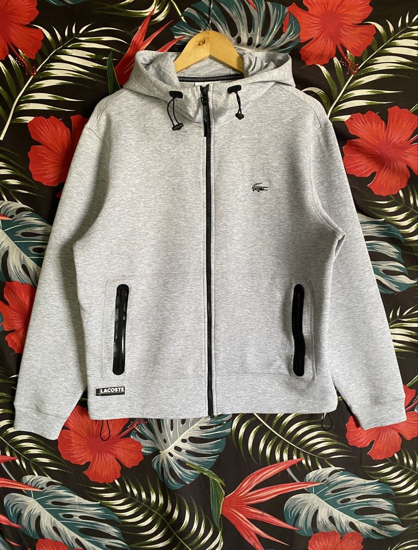 Lacoste Grey Zip-Up Hoodie (Category: Hoodies) located in Santa Barbara. Submitted by thrifthub24 (Listing ID 1461935142, Image 2). Description: - Grey Lacoste zip-up hoodie - Size: FR 3 / US S - Fit up to Large - Width: 22.5 - Length: 27 - Features a hood with drawstrings - Zippered pockets on the sides - Small Lacoste crocodile rubber logo on the chest - Ideal for casual wear Selling it for only ₱2,500 + Shipping Fee Pangasinan Location Can do 