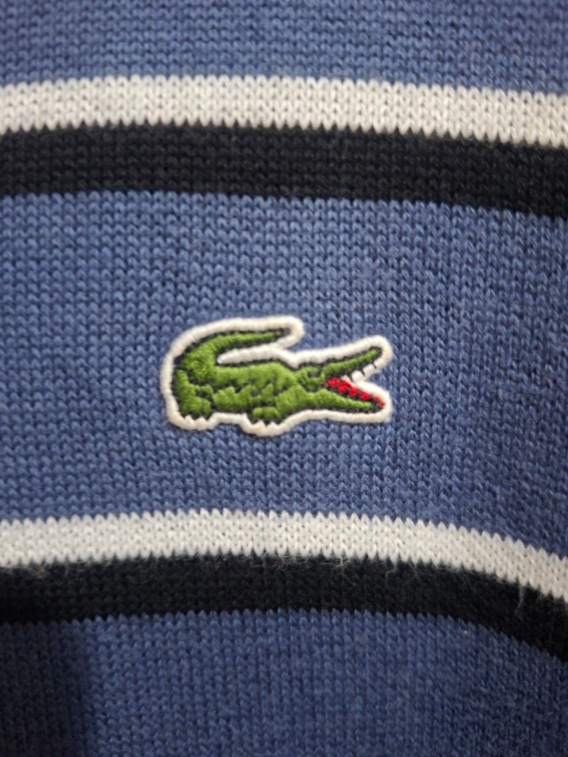 Lacoste Live Striped Sweater Size S (Category: Coats, Jackets and Outerwear) located in Lapu Lapu. Submitted by margaux099 (Listing ID 1461906757, Image 2). Description: - Lacoste Live blue and white striped sweater - Iconic crocodile logo on chest - Green collar detail - Material: Cotton and polyamide blend - Size: S - Ideal for casual wear .