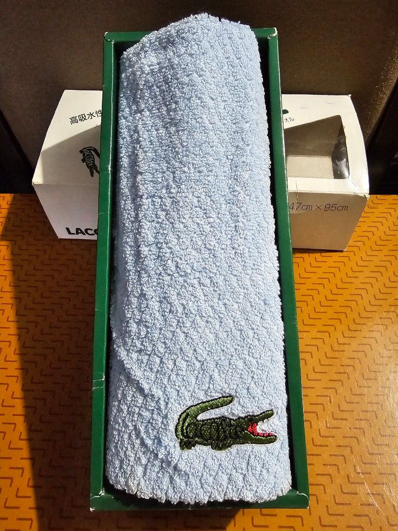 SALE❗LACOSTE Towel (Category: Bedding & Towels) located in Quezon City. Submitted by senyoramaria (Listing ID 1461900557, Image 2). Description: LACOSTE 18 x 38 inches Mas maliit kesa bath towel, good for traveling. *May dumi dun sa folded area, pero washable. Php800❗.