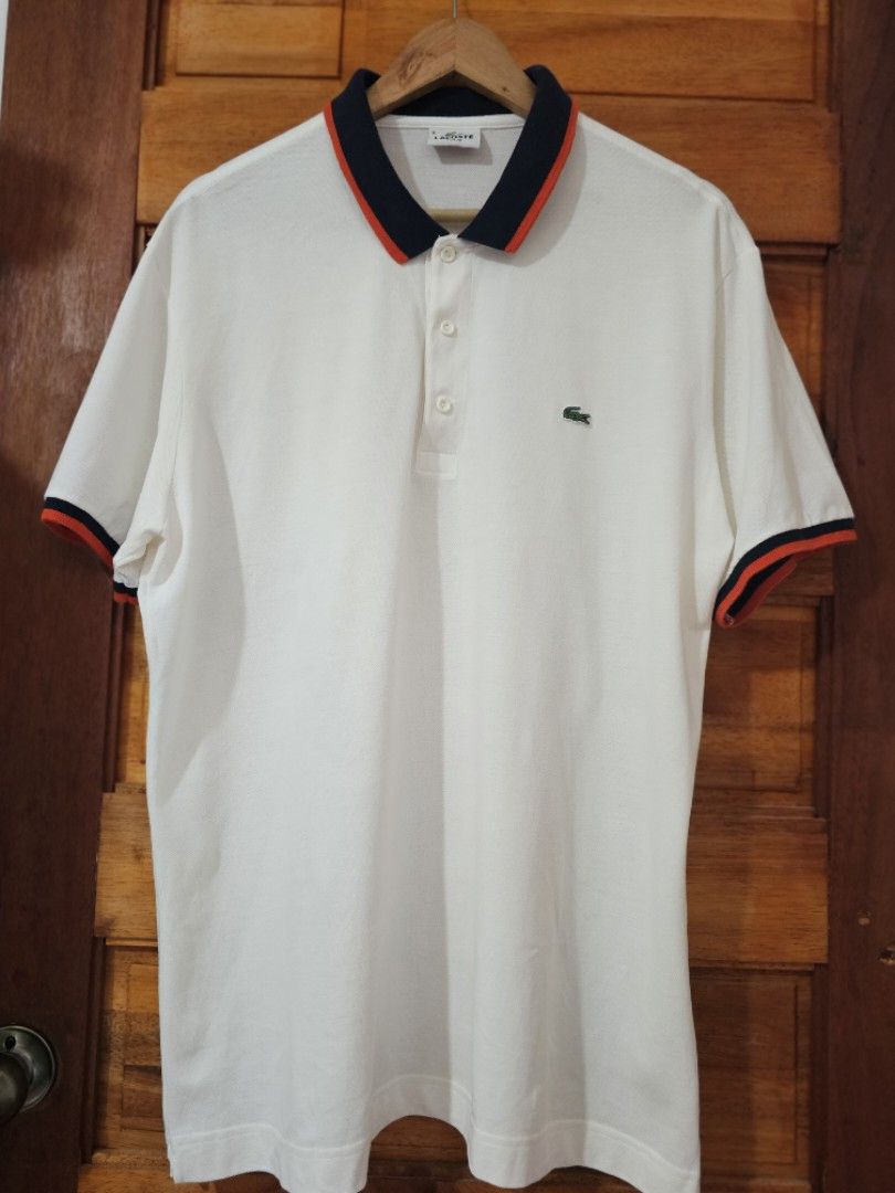 Lacoste White Polo Shirt (Category: Tshirts & Polo Shirts ) located in Dasmarinas. Submitted by ynnamargaux (Listing ID 1461805382, Image 3). Description: Brand: Lacoste Style: Regular Fit Contrast Collar/Tipped Polo Shirt 100% Cotton Color: White with Navy and Red Size : 8 SLIMFIT.