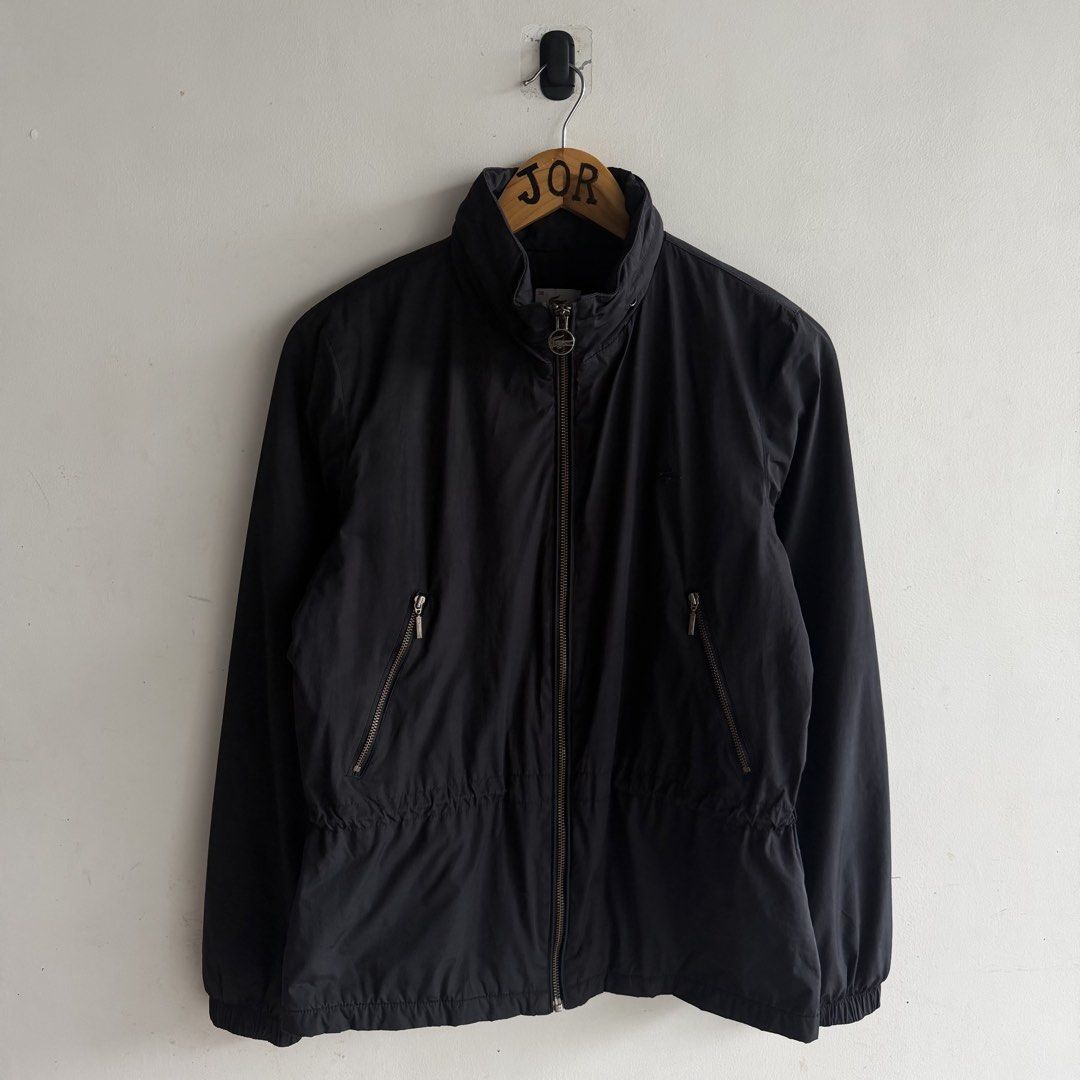 Lacoste windbreaker jacket (Category: Coats, Jackets and Outerwear) located in San Fernando. Submitted by jorjorr (Listing ID 1461871844, Image 1). Description: Lacoste windbreaker jacket Guaranteed Original 💯 38 on tag Womens 21 width 26 length Excellent condition Minimal issue cut wash-tags and cut hood Color may vary due to lighting P1,899.